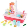 A toy sink with accessories, including a faucet, dishes, and cleaning supplies. Náhled obrázku produktu