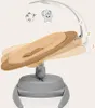 A baby bouncer chair with a mobile attachment, showing different reclining positions. Produktbild-Vorschau