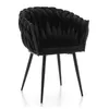A black velvet accent chair with a woven back and black metal legs is photographed against a white background. Náhľad obrázku produktu