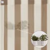 A close-up of a striped privacy screen with a small inset showing two potted plants. Podgląd zdjęcia produktu