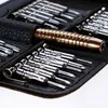 A close-up view of a set of precision screwdrivers and a handle, neatly arranged in a black case. Produktbild-Vorschau