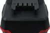 A close-up view of the top of a black and red battery pack. Produktbild-Vorschau
