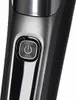 A close-up of a power button on a grooming device. Produktbild-Vorschau