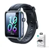 A smartwatch and its packaging are displayed against a white background. Náhled obrázku produktu