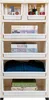 A multi-drawer storage unit filled with various items like books, clothing, and toiletries. Voir les images du produit