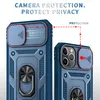 Close-up view of two blue phone cases with camera protection sliders and ring holders. Produktbild-Vorschau