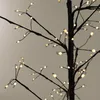 Close-up of a decorative tree with LED lights. Podgląd zdjęcia produktu