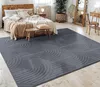 A bedroom scene with a bed, rug, and furniture. Anteprima dell’immagine prodotto