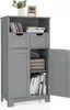 A gray bathroom cabinet with its doors open, displaying books and decorative items inside. Náhled obrázku produktu