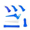 A collection of blue and white plastic dispensing nozzles and accessories, arranged on a white background. Podgląd zdjęcia produktu