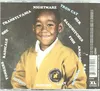 The back cover of a CD case featuring a childhood photo of Tyler, The Creator, with song titles arranged around him. Produktbild-Vorschau
