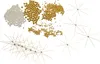 A collection of gold and white beads and several wire starburst decorations. Produktbild-Vorschau