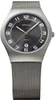A close-up studio shot of a Bering men's watch with a titanium mesh band and a dark gray dial. Produktbild-Vorschau