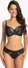 A woman is modeling a black lace bra and matching underwear. Produktbild-Vorschau
