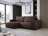 A modern living room with a dark brown sectional sofa, large windows, and decorative wall paneling.