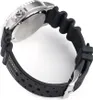 A close-up, angled view of a watch with a black rubber strap. Anteprima dell’immagine prodotto