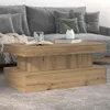 A coffee table in a living room setting with a sofa in the background. Náhled obrázku produktu
