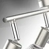 Close-up view of a modern track lighting fixture with a brushed metal finish. Anteprima dell’immagine prodotto