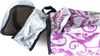 A close-up, angled view of an open toiletry bag with a floral pattern. Produktbild-Vorschau