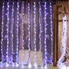 A room decorated with string lights and pillows. Produktbild-Vorschau