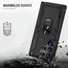 A black phone case with a ring holder is shown, with debris falling around it, suggesting durability and protection. Produktbild-Vorschau