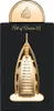 A gold-colored perfume bottle shaped like a skyscraper, presented in a black box with gold text. Voir les images du produit