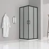 A modern bathroom with a shower cabin, bathrobe, and towel rack. Produktbild-Vorschau