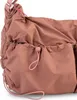 Close-up of a pink drawstring bag. Anteprima dell’immagine prodotto