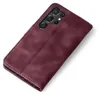 A burgundy flip case for a smartphone is shown from a diagonal angle against a white background. Produktbild-Vorschau