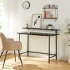 A home office setup with a desk, chair, and wall shelves. Náhľad obrázku produktu