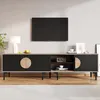 A modern TV stand with a TV mounted above it, in a living room setting. Anteprima dell’immagine prodotto