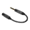 A close-up studio shot of an audio adapter cable against a white background. Podgląd zdjęcia produktu
