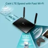 A marketing image showing a TP-Link Archer MR200 router with various speed indicators and icons of connected devices. Podgląd zdjęcia produktu