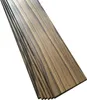 A stack of wooden planks with a dark and light striped grain pattern, arranged diagonally against a white background. Podgląd zdjęcia produktu