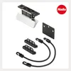 A product shot of a foot pedal and accessories against a white background. Voir les images du produit
