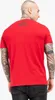 A man wearing a red t-shirt from behind. Produktbild-Vorschau