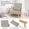 A rocking chair in a room with decorative pillows and a small side table. Podgląd zdjęcia produktu