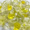 Gelber und transparenter Glassplitt dicht aneinander liegend Produktbild-Vorschau