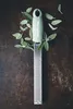 A Microplane grater is shown with sage leaves scattered around it on a dark, textured surface. Anteprima dell’immagine prodotto