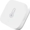 A white Aqara temperature and humidity sensor with a thermometer icon on top. Voir les images du produit