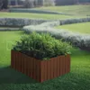 A wooden planter box filled with green foliage sits on a manicured lawn in a garden setting. Voir les images du produit
