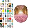 A collage of various toilet seat designs arranged on a white background, with a large image of a toilet seat featuring a floral pathway in the center. Náhled obrázku produktu