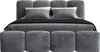 A gray upholstered bed with two pillows and a dark blanket. Produktbild-Vorschau