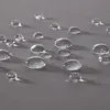 Close-up of water droplets on a textured gray surface. Náhled obrázku produktu