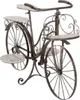 A decorative metal and wood plant stand shaped like a bicycle. Produktbild-Vorschau