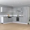 A modern kitchen with gray wood grain cabinets and white countertops. Produktbild-Vorschau
