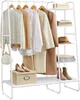 A white metal garment rack with clothes, shoes, and accessories displayed on it. Náhled obrázku produktu