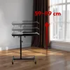 A mobile laptop stand is shown in a room with a window and curtains. The stand is depicted at different heights. Náhľad obrázku produktu