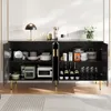 A black sideboard cabinet with gold accents, filled with various kitchen and dining items, displayed in a well-lit room. Produktbild-Vorschau