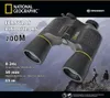 Binoculars are shown in a mountainous landscape with two hikers in the background. Produktbild-Vorschau